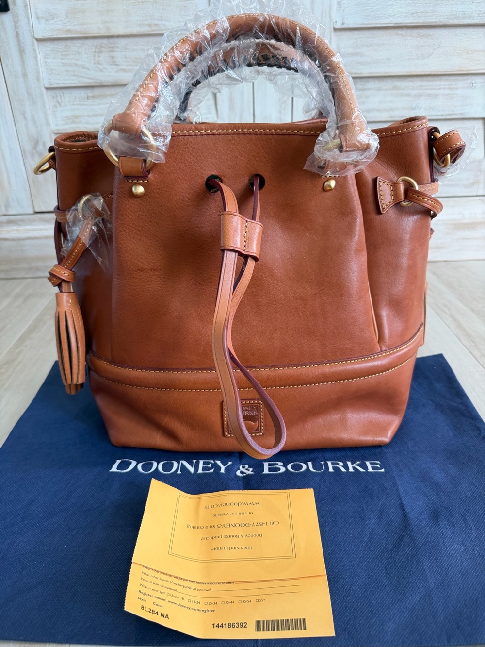 Dooney & Bourke Cognac Leather Drawstring Tote with Tassel